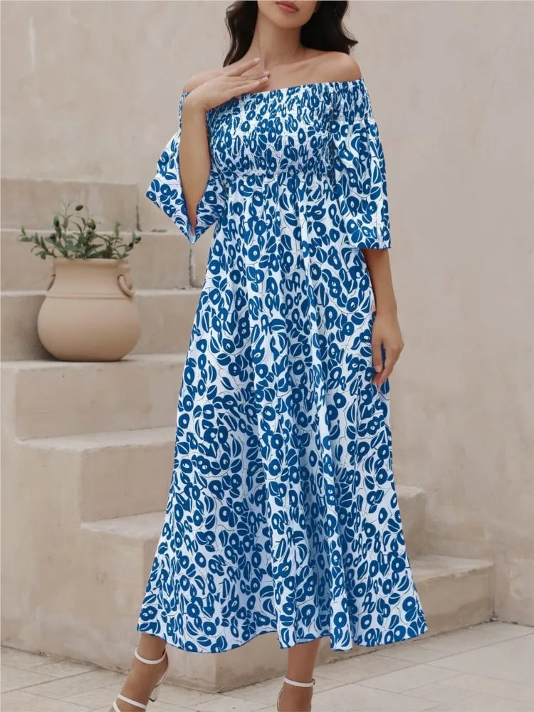 Vestido Longo Floral com Decote Ombro a Ombro e Bolsos