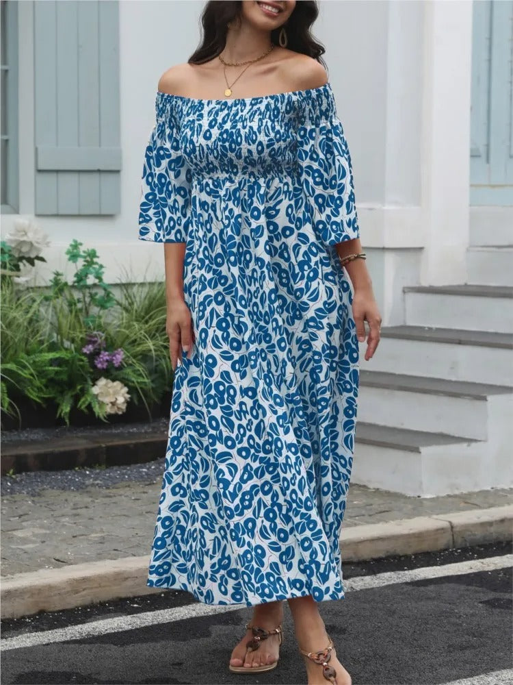 Vestido Longo Floral com Decote Ombro a Ombro e Bolsos
