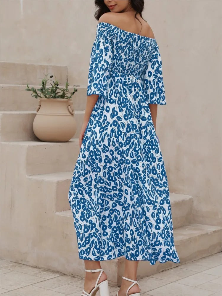 Vestido Longo Floral com Decote Ombro a Ombro e Bolsos